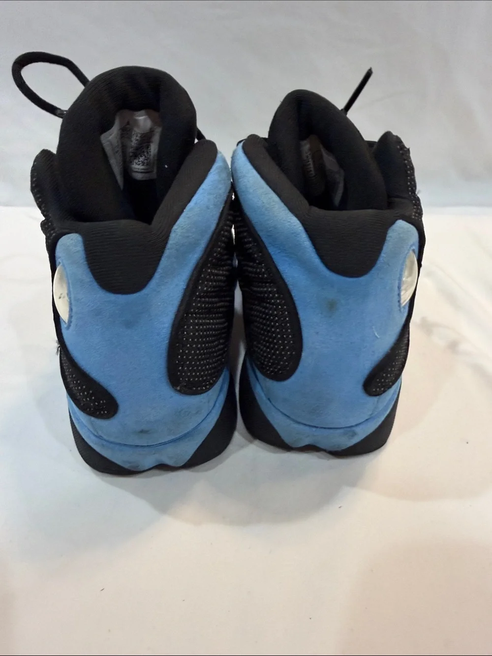 Jordan Men's Black and University Blue Retro Sneakers